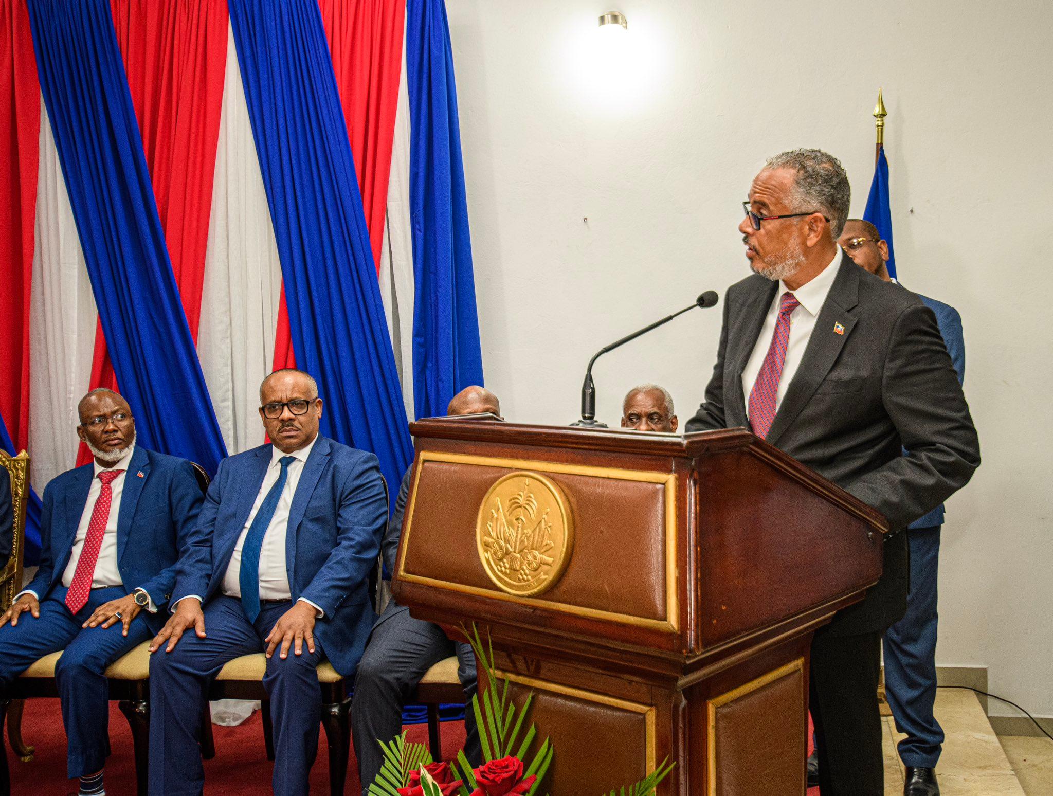 New Haiti PM sworn in as airliner hit by gunfire