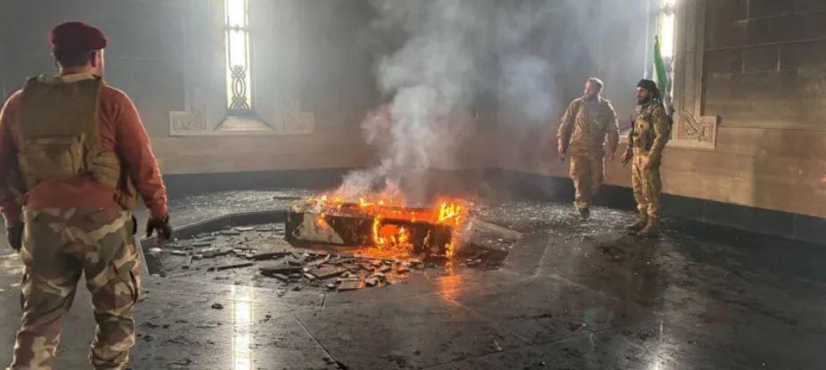 Syria rebels burn tomb of Bashar al-Assad's father