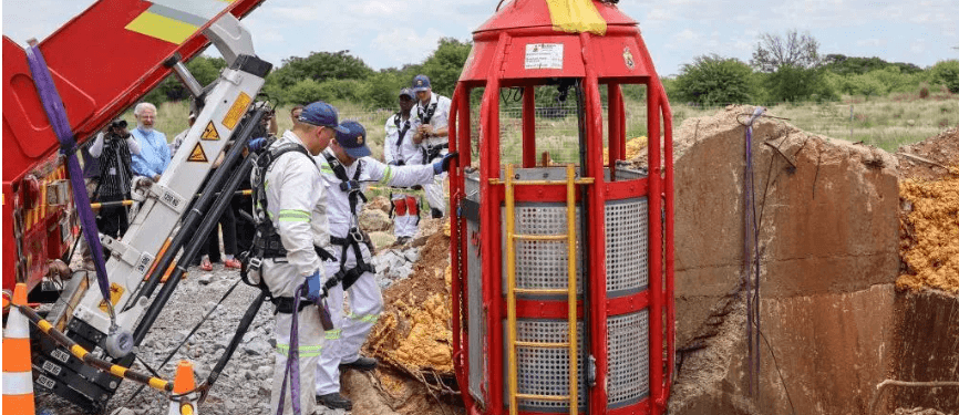 Trapped underground with decaying bodies, miners faced a dark reality