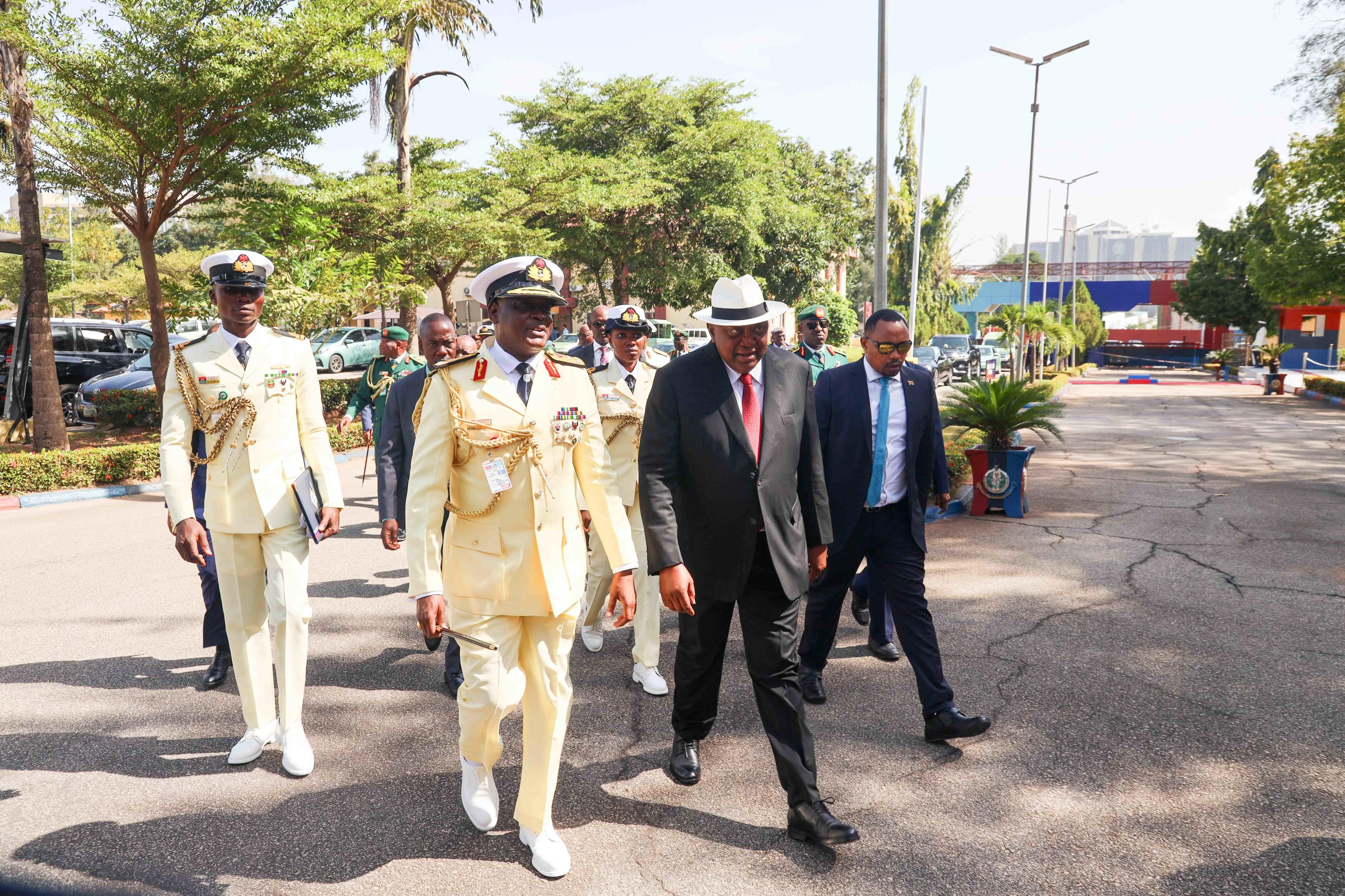 PHOTOS: Uhuru speaks at military event in Abuja