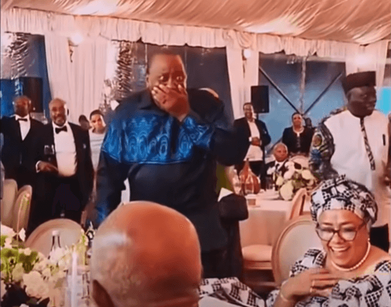 Uhuru treated to surprise birthday at a wedding