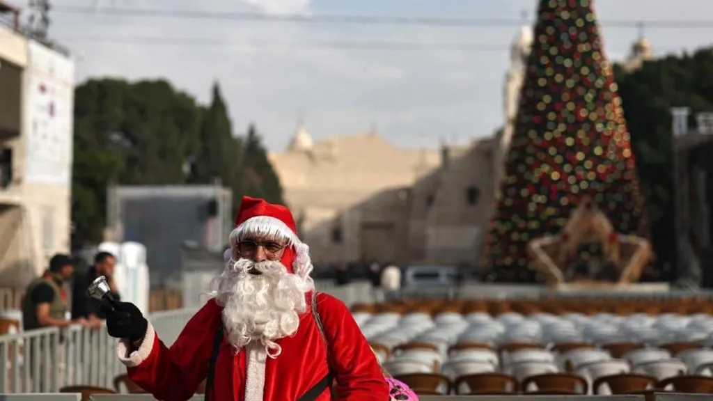 Bethlehem Christmas tree lights up for first time since start of Gaza war